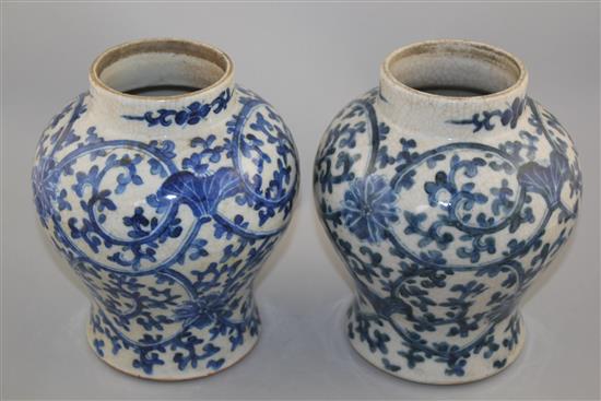 A pair of Chinese blue and white crackle glaze baluster vases, late 19th / early 20th century, 22cm